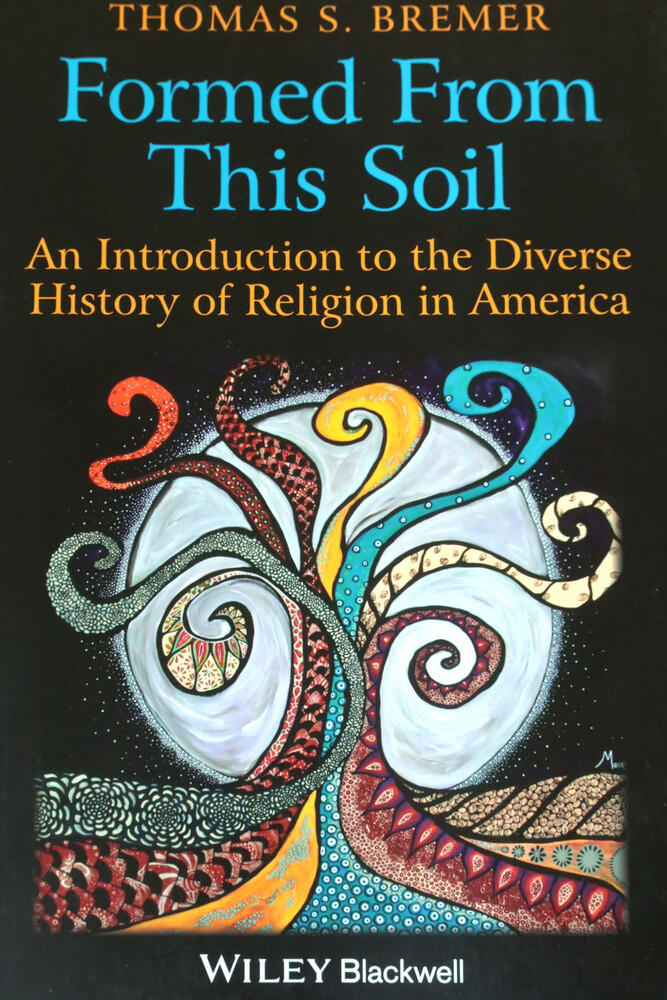 Formed from this Soil book cover The cover of the book Formed From This Soil by Thomas S. Bremer features a stylized, abstract tree with swirling branches and roots, evoking themes of religion, set against a black background with the subtitle in yellow and blue text.